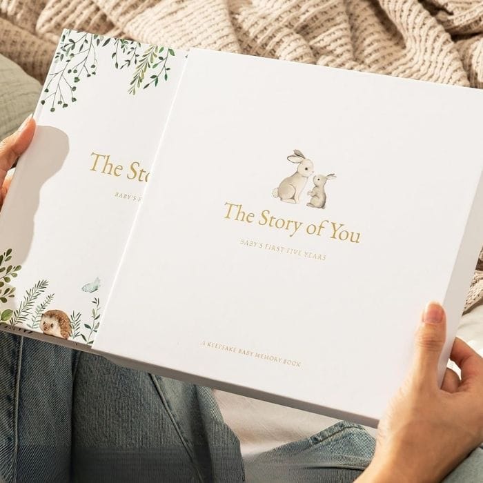 the story of you baby book with bunnies on the front